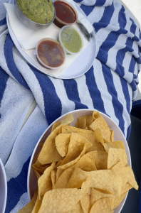 Large portion of chips and guacamole served at the Oasis day bed at Fontainebleau Las Vegas