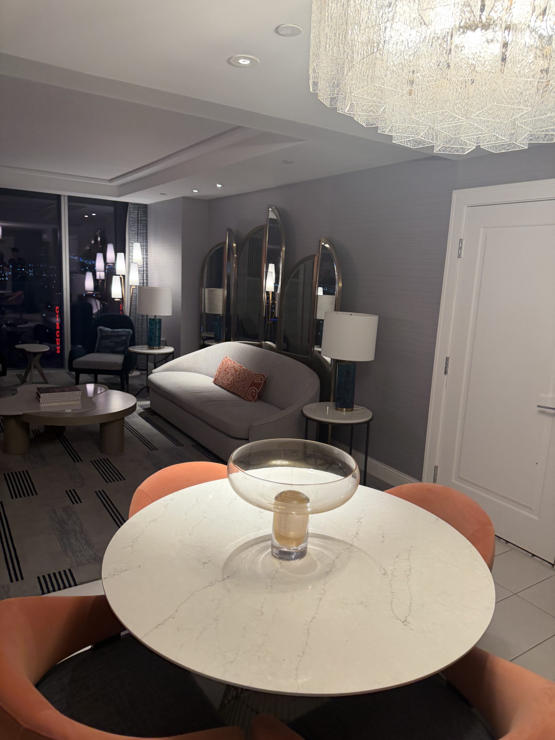Regal Suite living room at Fontainebleau Las Vegas with marble dining table and chandelier
