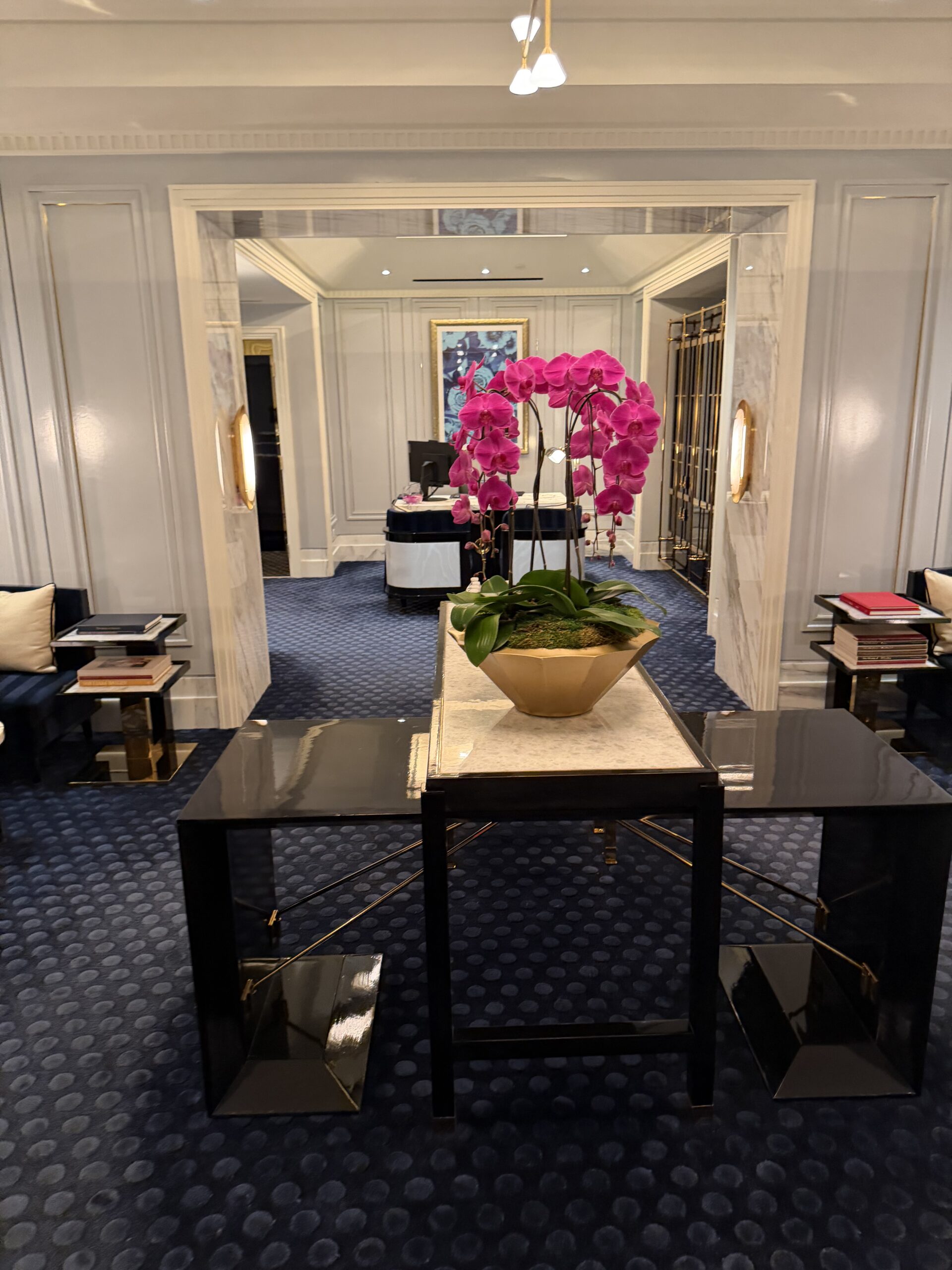 Fontainebleau Las Vegas lobby with pink orchid centerpiece in a gold bowl